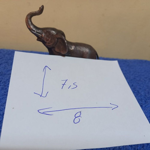 Small cast metal elephant figurine used, dark bronze finish