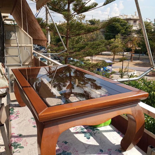 Solid wood coffee table with glass