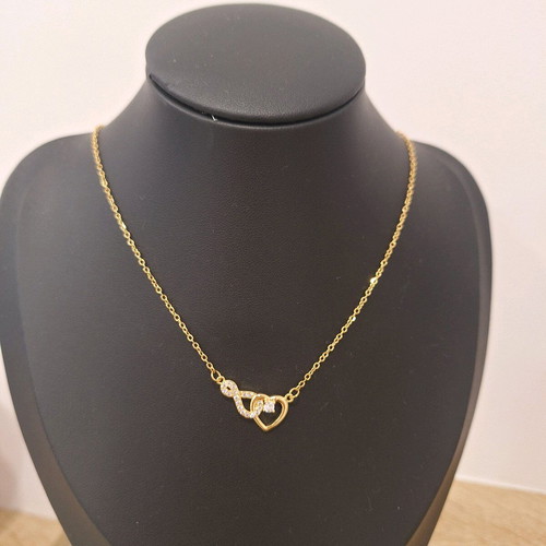 Stainless steel necklace new in gold color with infinity and heart design