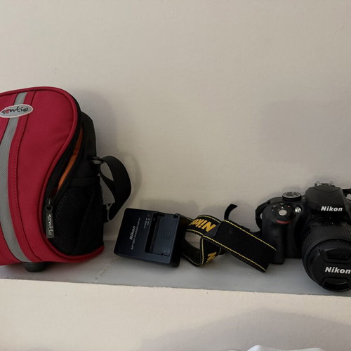 Nikon D3300 camera with 18–55mm lens, case, battery and charger