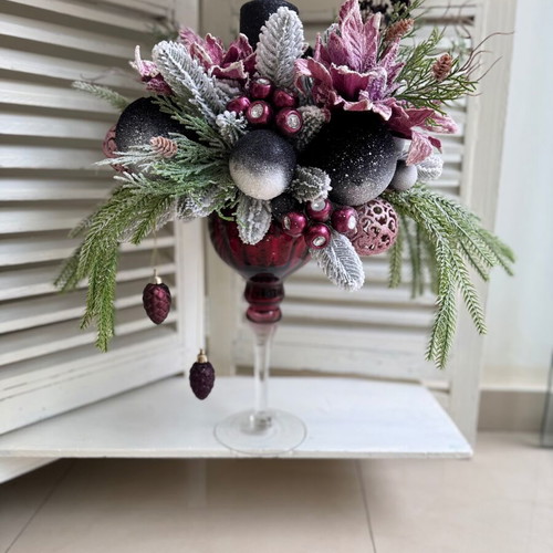 Christmas decoration in glass candlestick