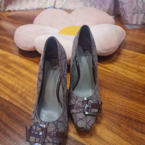 Calvin Klein burgundy high heels used with unique design
