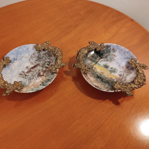 Andreas Zymatikas handpainted porcelain decorative plates, pair
