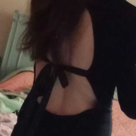 Black turtleneck dress with open back like new, fitted
