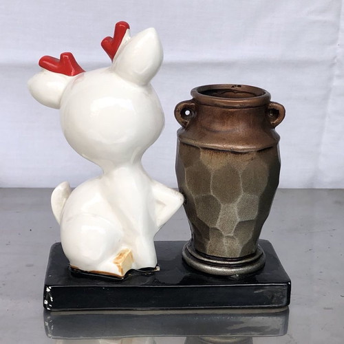 Ceramic decorative vase with thermometer used