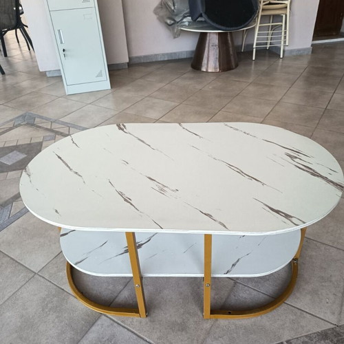 Oval coffee table with marble effect