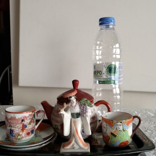 Decorative miniature tea set like new, fine porcelain