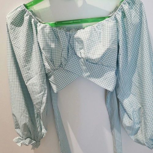 Decoro top like new, small, multicolored with back bow