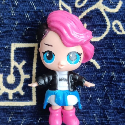 Doll figure from ball toy, black-pink hair, blue eyes