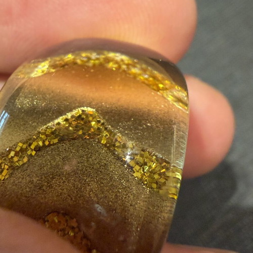 Clear resin ring with gold patterns, size 17