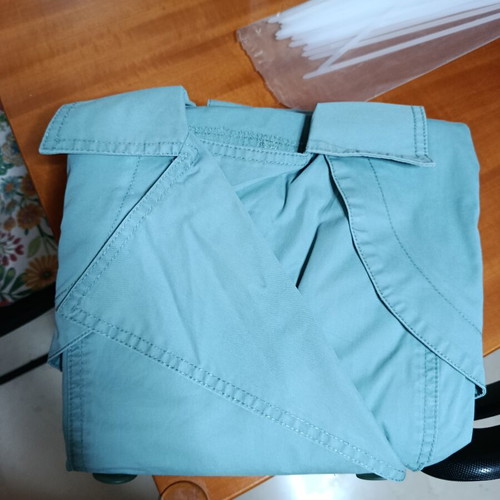 Turquoise trench coat, size M