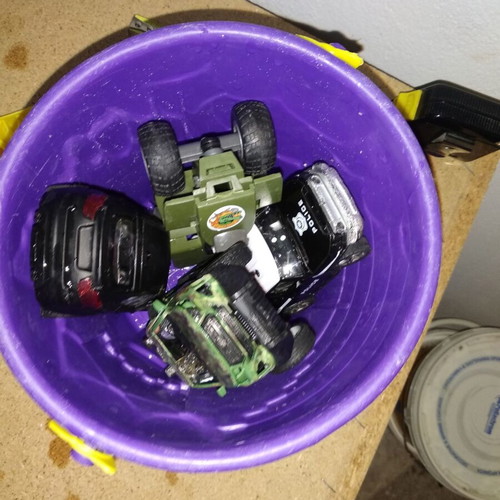 Sand bucket used with shovel, rake and 4 toy cars