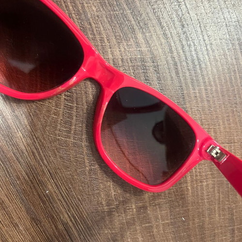 Sunglasses with red-pink frame, recently replaced lenses
