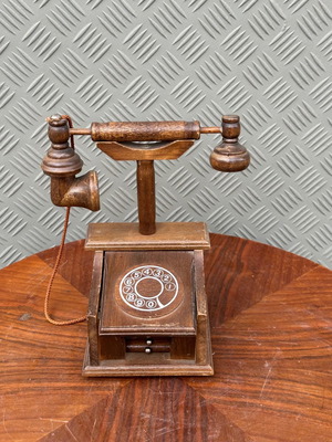 Wooden placemat old with telephone design used