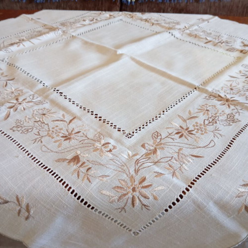 Ecru semi-linen tablecloth with beige floral embroidery and handmade cutwork