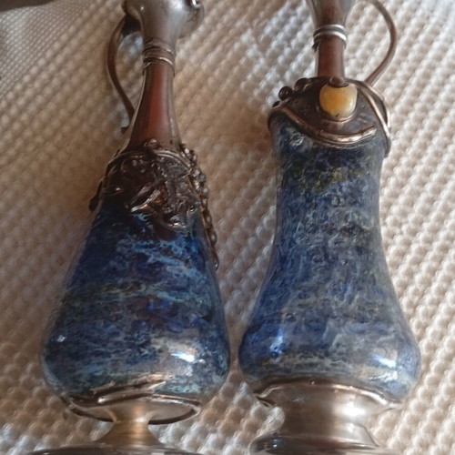 Vintage decorative silver pitchers with blue blown art glass