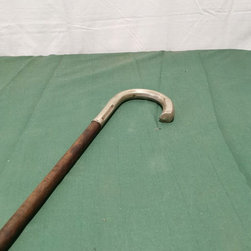 Wooden walking cane used with metal handle, 1920