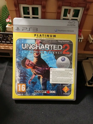 Uncharted 2: Among Thieves Platinum Edition PS3 used with manual