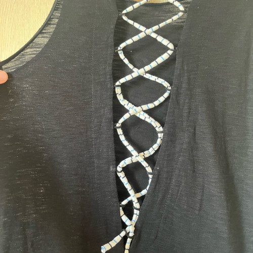 Small cotton salopette used with pockets