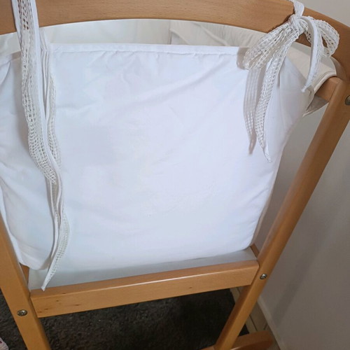 Vintage wooden baby cot with used Greco Strom mattress