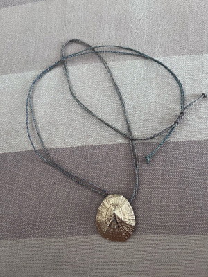Long cord necklace adjustable, like new, metallic gold color