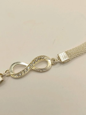 Astragalos bracelet new with infinity element 23cm
