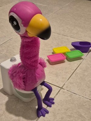 Flamingo Gotta Go interactive toy used, pink plush with electronic head