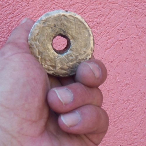 Brass weight with hole, 850 grams