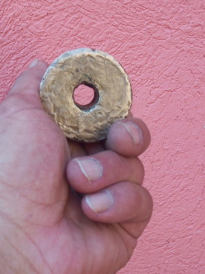 Brass weight with hole, 850 grams