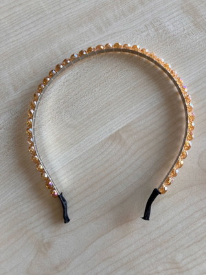 Hairband like new, gold with stones and ear protectors