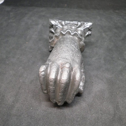 Antique iron door knocker used, made of cast iron