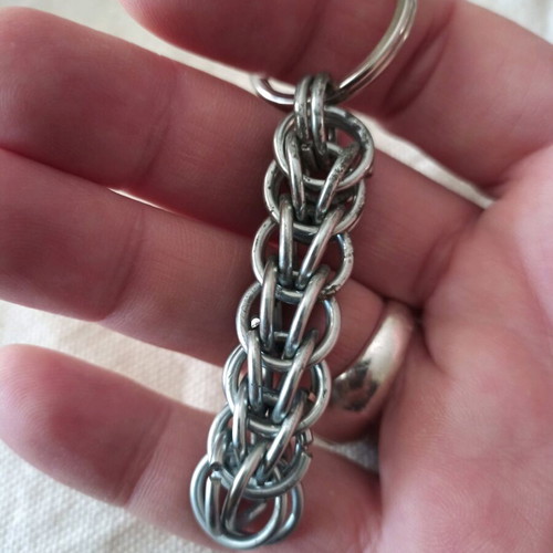 Steel keychain like new, Persian knot