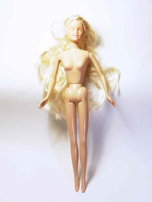 Doll used, non-genuine with defects