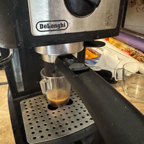 Delonghi espresso machine and coffee grinder used