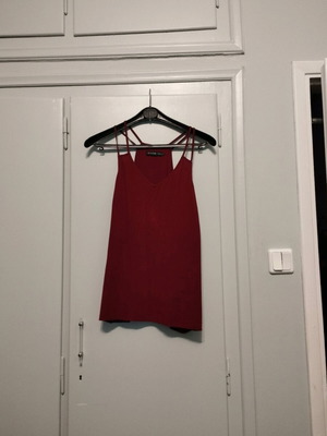 Red blouse used with special straps, size S