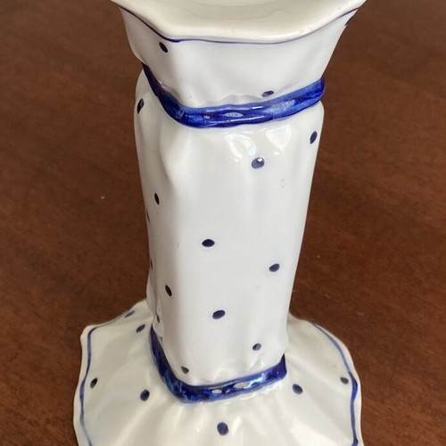 Vintage porcelain candlestick with blue bows and dots, used, damaged