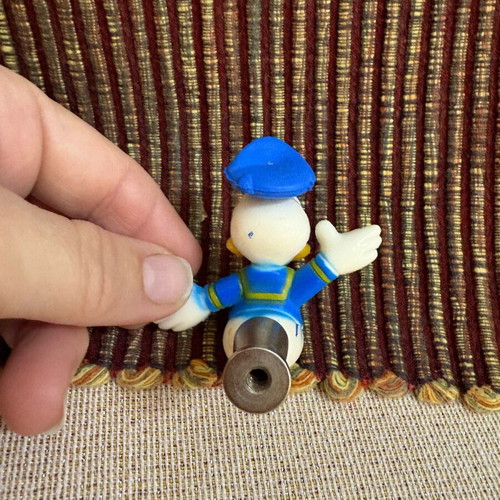 Set of six collectible Mickey Mouse and Donald Duck knobs like new