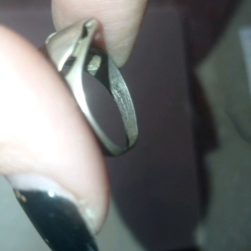 Silver bow ring used