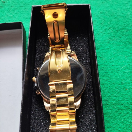 Men's Watch gold color with blue dial and metal bracelet like new