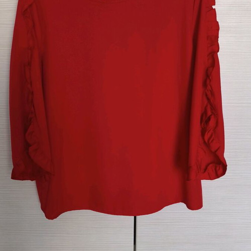 Women's red blouse with ruffles like new, size L