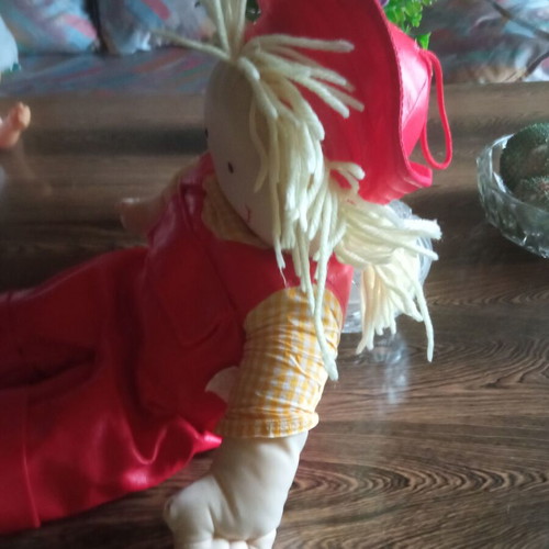 Children's doll like new, fabric with leatherette