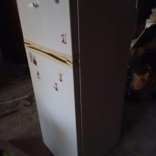 Whirlpool refrigerator with separate freezer and fridge door, like new
