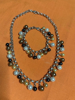Jewelry necklace bracelet and earrings new with natural brown and yellow pearls