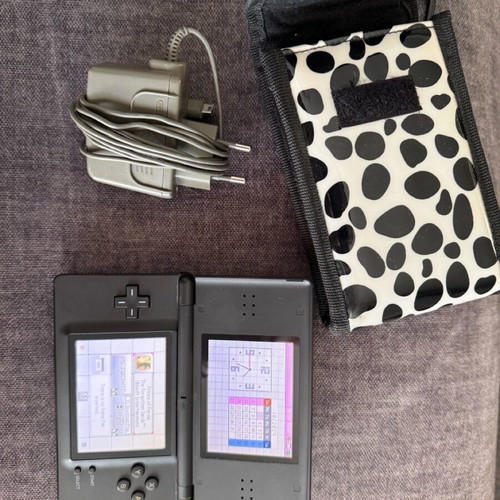 Nintendo DSLite used with 8 games and case