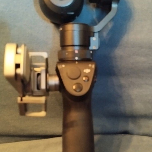 Camera Dgi Osmo + Plus handheld 4K 12MP like new with accessories