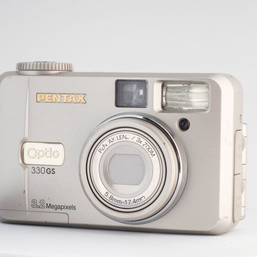 Pentax Optio 330GS 3.2MP vintage digital camera used with flip-up screen