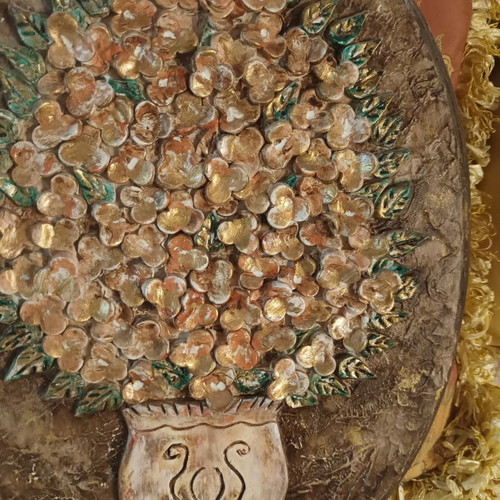 Handmade wall decoration with decoupage and clay flowers
