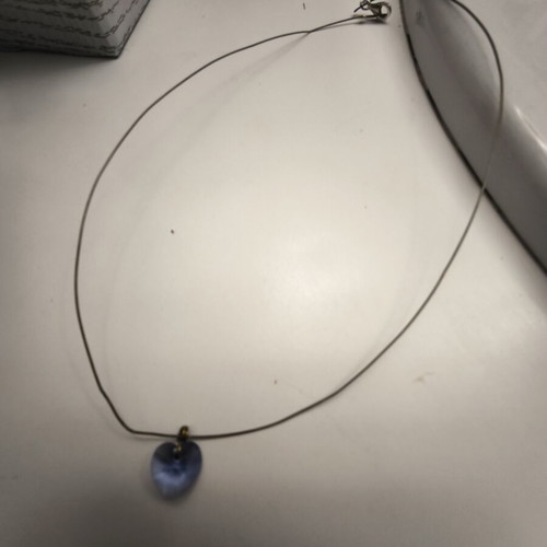 Purple crystal heart necklace like new with flexible hypoallergenic steel wire