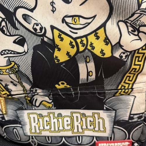 Sprayground Richie Rich backpack with laptop compartment