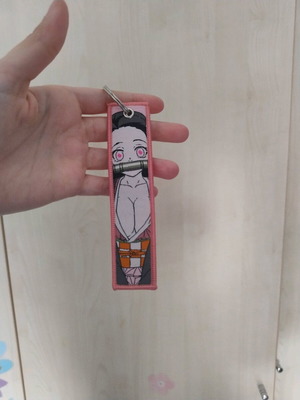 Nezuko anime keychain like new, multicolored